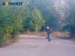 С раннего утра в поселке Жилкооп Донецка кипит работа по ремонту центральной улицы Грузинской 