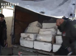 Народный фронт ДНР доставил обувь и продуктовые наборы для инвалидов