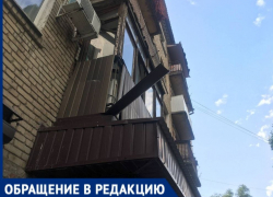 Обшивка балконов в Донецке летит на головы горожан 