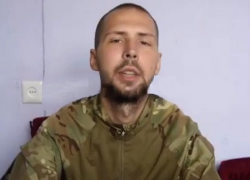 Черепа и черное солнце «спалили» азовца из Запорожья, осужденного на 18 лет колонии в Донецке